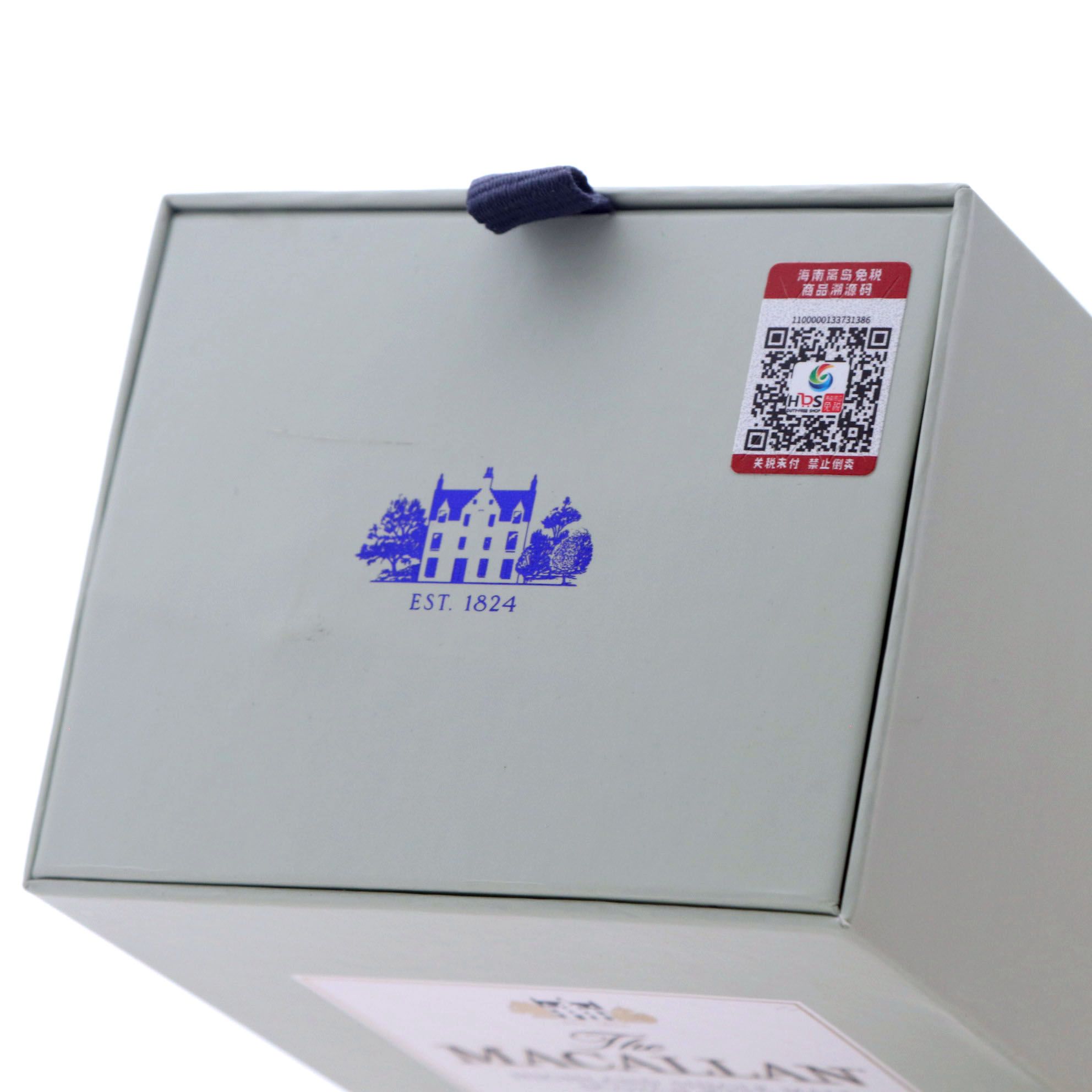 Small sticker on box lid